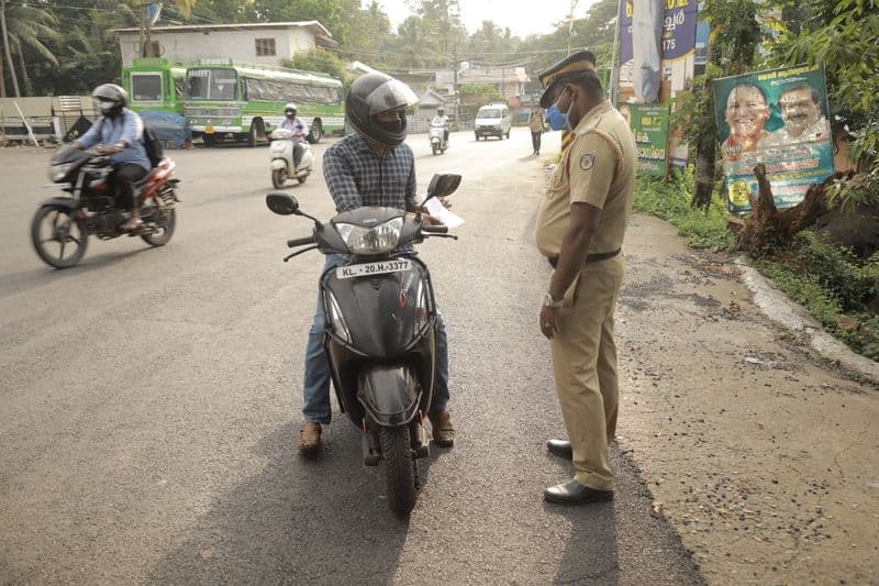 Madurai police warns people who are came out from house without any reason