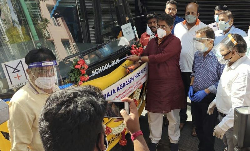 Minister R Ashok launches oxygen bus service for covid patients outside hospital Bengaluru ckm