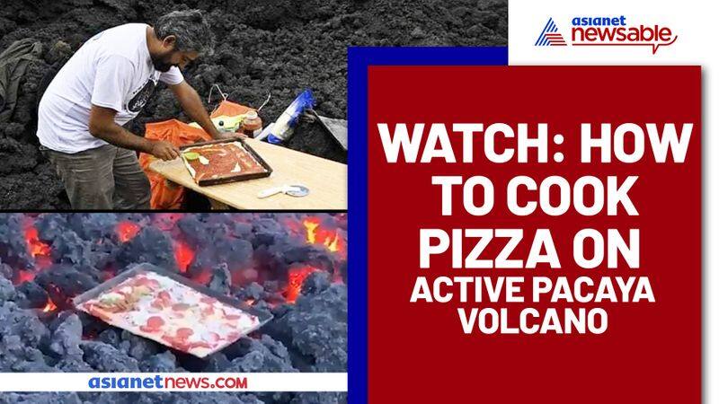 Man cooks pizza on smouldering volcanic lava In Guatemala; Viral Video - gps