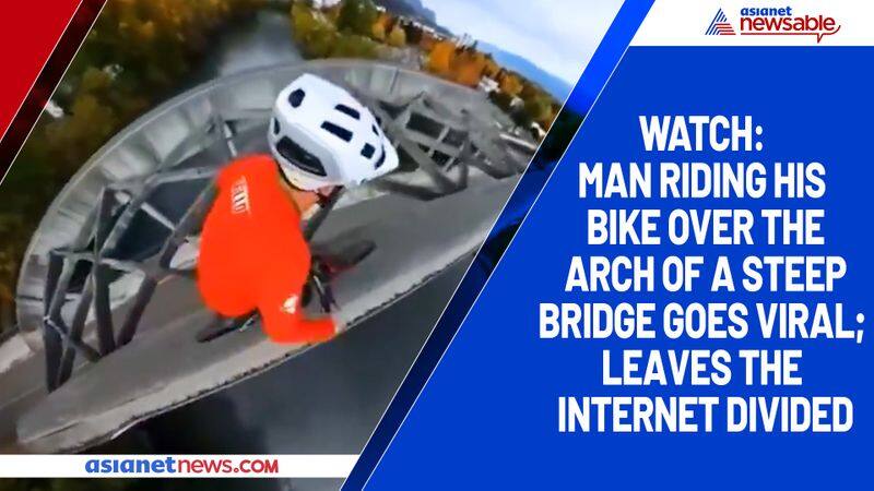 Watch Man riding his bike over the arch of a steep bridge goes viral; leaves the internet divided-tgy