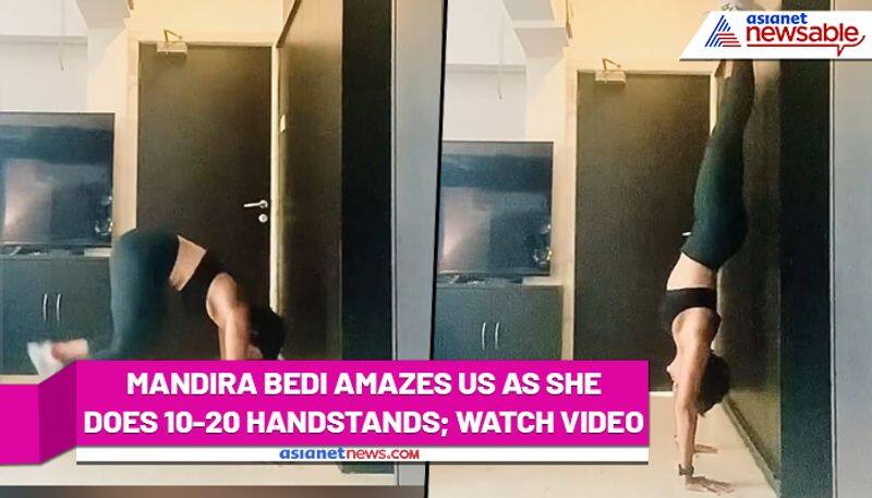 Mandira Bedi flaunts her killer abs and shows 10-20 Handstands; Watch Video - gps