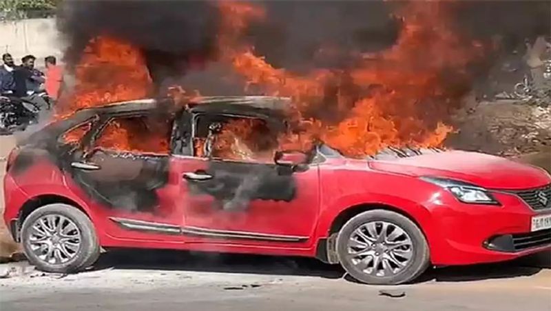 Narrow escape for four as car catches fire on Rajiv highway near karimnagar