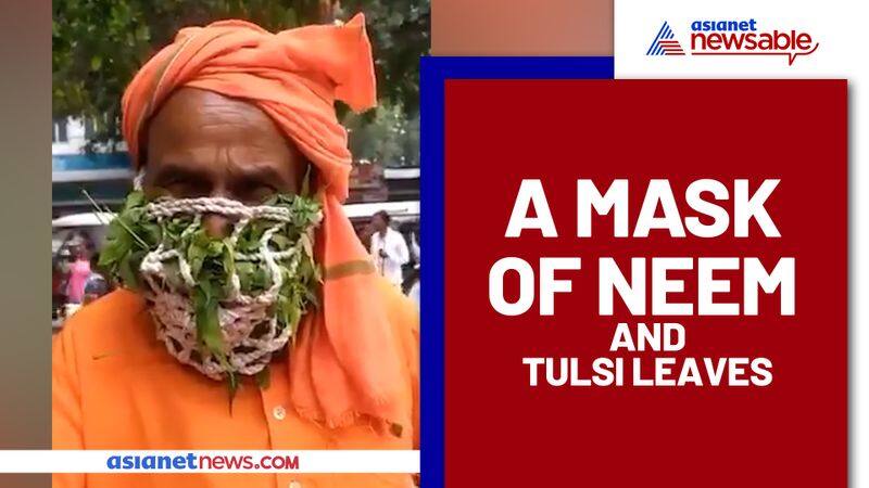 Natural Jugaad: Saint wears a mask made of 'Neem and Tulsi leaves'; Watch Video - gps