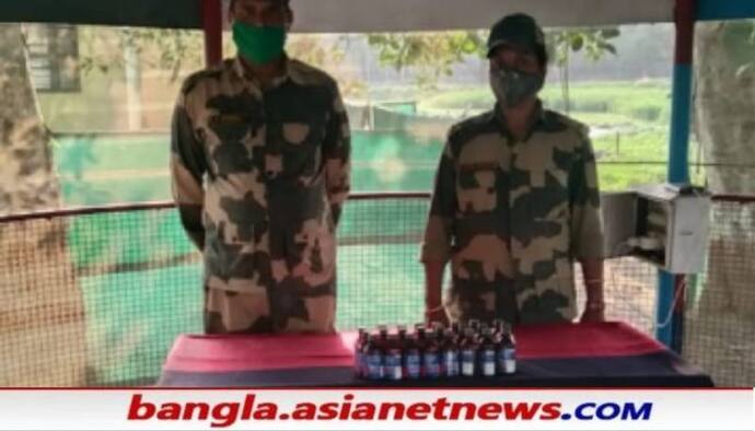 BSF-র জালে মহিলা পাচারকারী, উদ্ধার ২৪ বোতল ফেনসিডিল