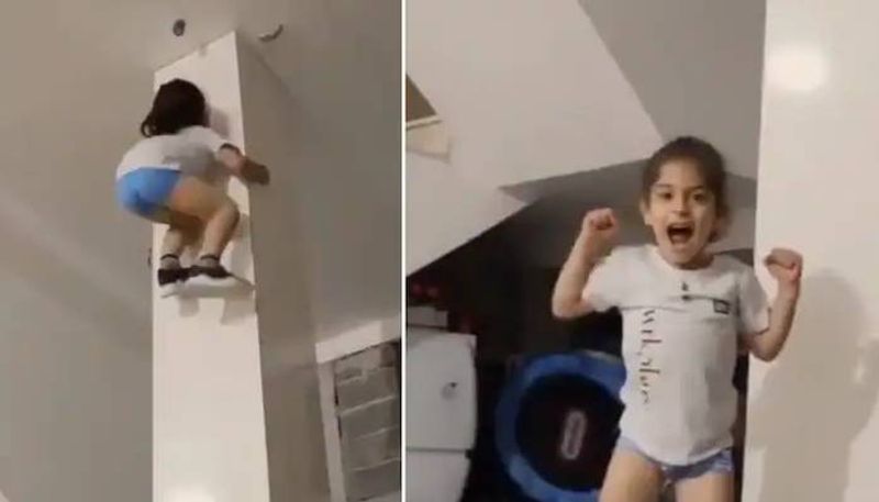 7 year old boy climbs a pillar in viral video