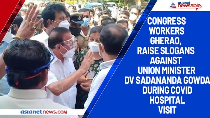 Congress workers gherao, raise slogans against Union Minister DV Sadananda Gowda during COVID hospital visit-ycb