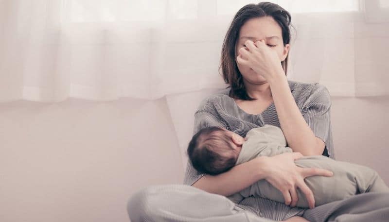 symptoms and reasons of postpartum depression