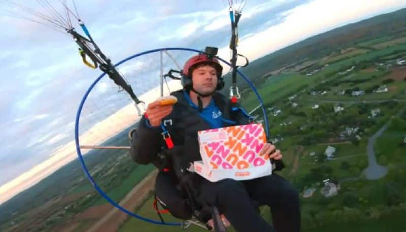 Man Flies to eat Donuts video viral