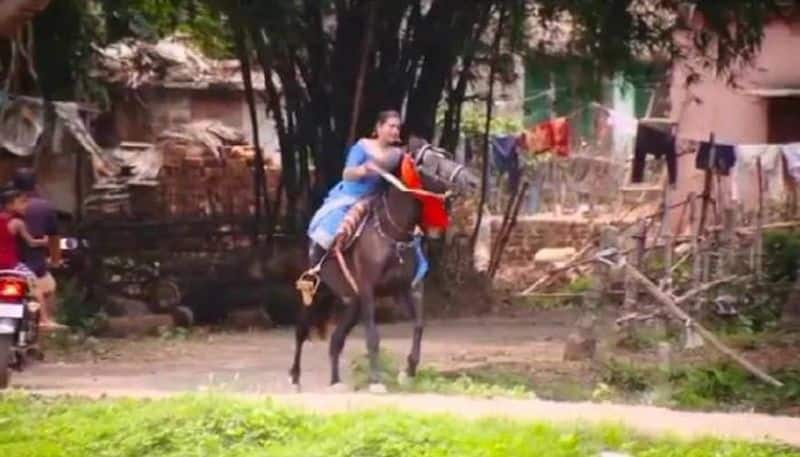 video of saree clad Odisha woman riding a horse is crazy viral