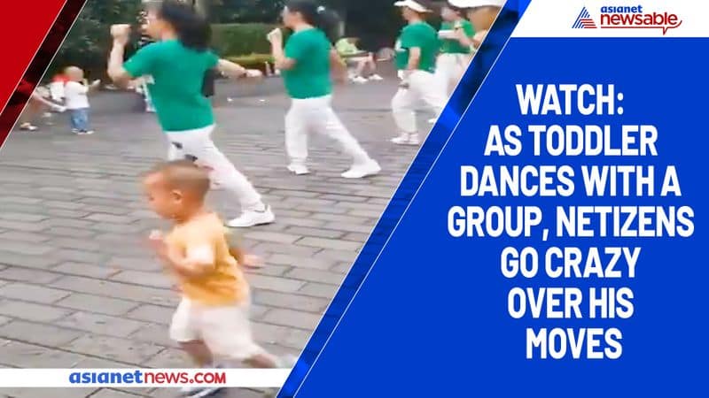 Watch As toddler dances with a group, netizens go crazy over his moves-tgy