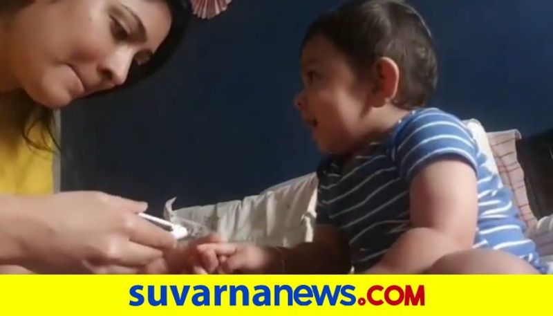 Actress Radhika Pandit cuts son Yatharv nail video goes viral vcs