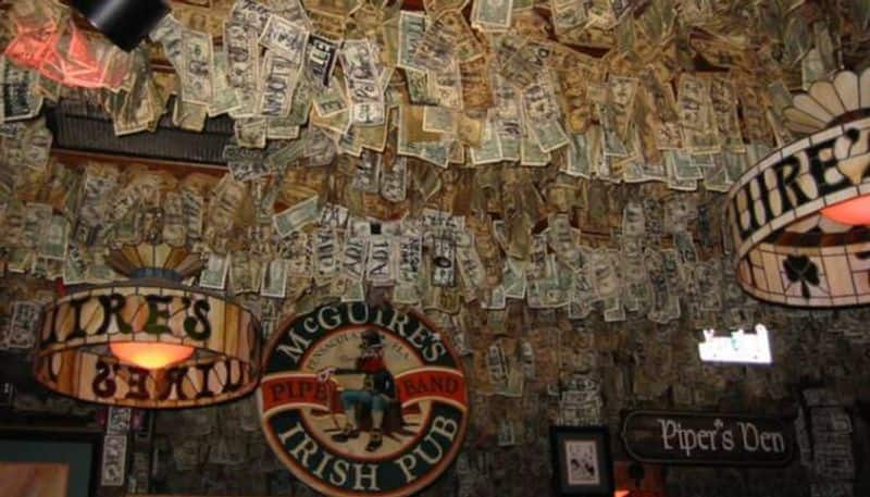 pub decorated with dollars