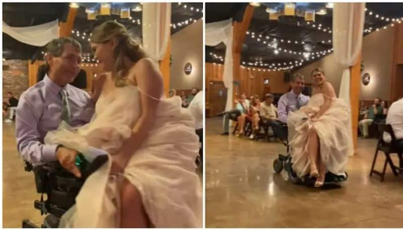 Daughter arrives at the wedding venue in a wheelchair on her father's lap