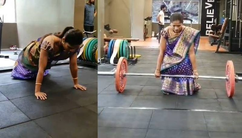 woman in saree does push ups and weight training in viral video