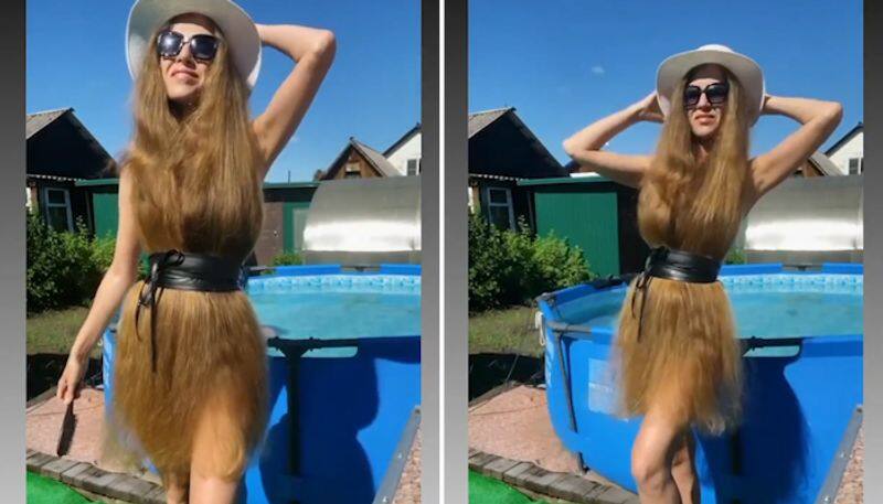 Viral video: Girl using her long hair as dress leaves netizens amazed-tgy