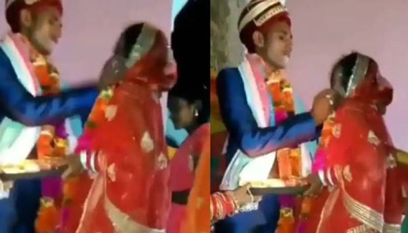 groom forced bride to eat sweet video