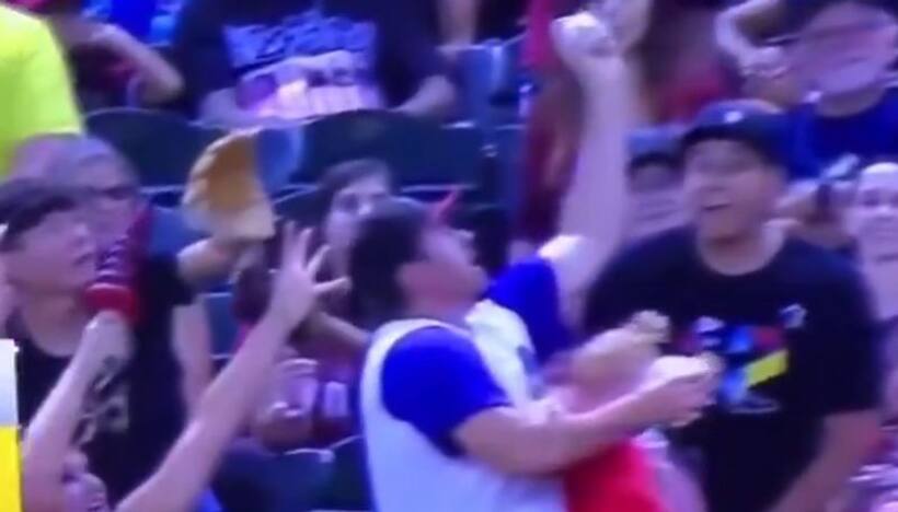 Dad drops baby to catch ball during baseball game; watch what happened next