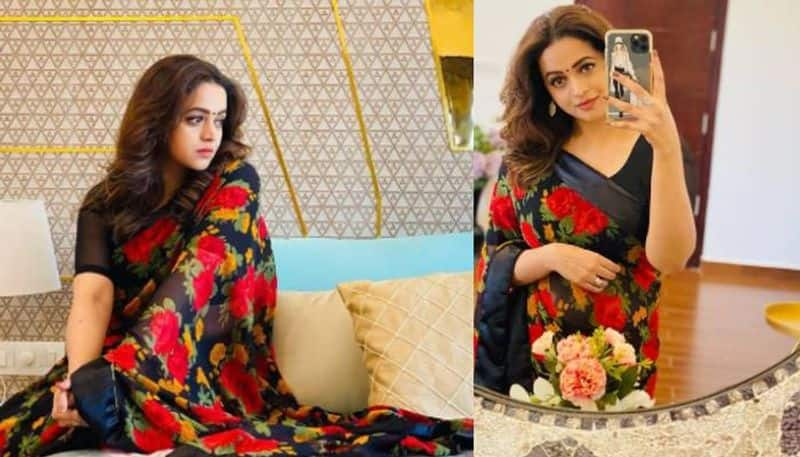 Actress Bhavana Looks stunning in floral saree