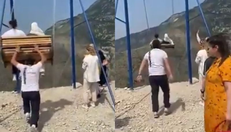 women fall off swing on the edge of cliff