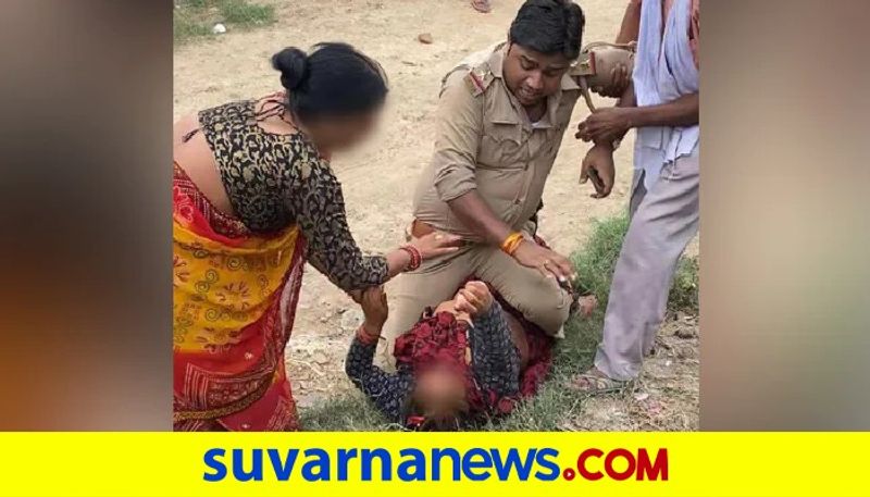 Cop accused of beating woman sitting on top of her in UP Kanpur Dehat pod