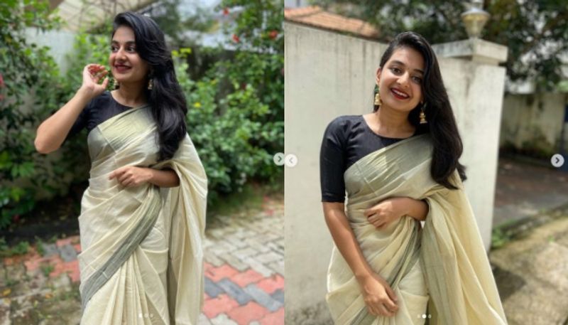 esther anil photos in kerala saree