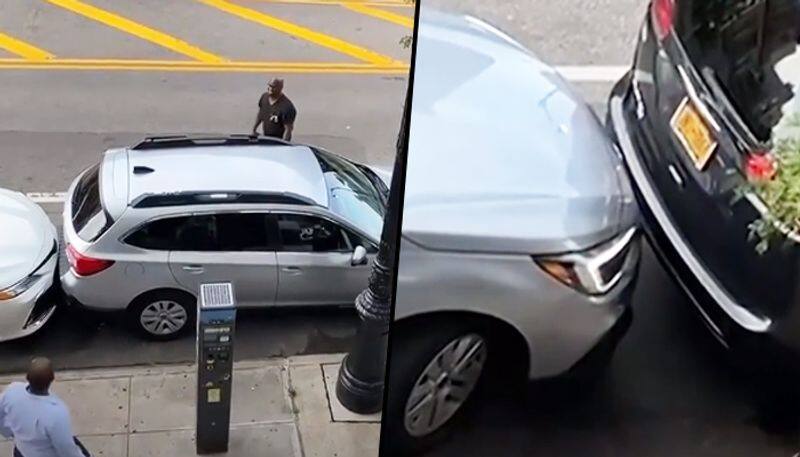 Man moves car out of tight parking spot; watch viral video - gps