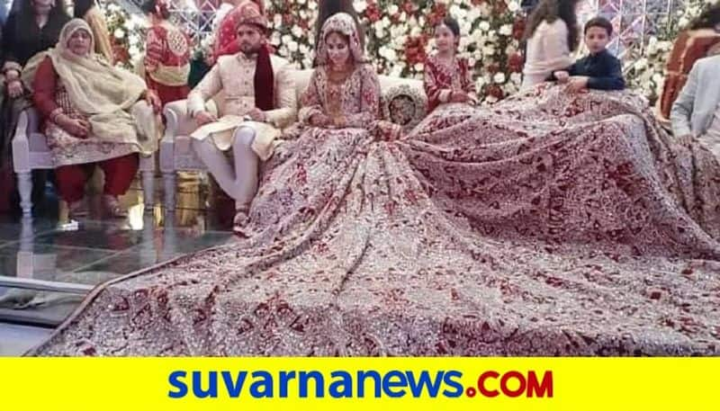 Pakistani Bride Wore A 100 Kg Lehenga On Her Wedding Day Covering The Entire Stage dpl