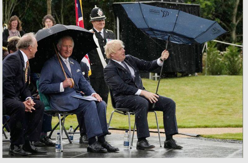 Boris Johnson struggles with his umbrella video goes viral gcw