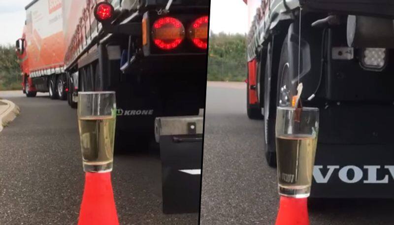 Truck diver drops tea bag in glass of hot water by using his heavy goods vehicle - gps