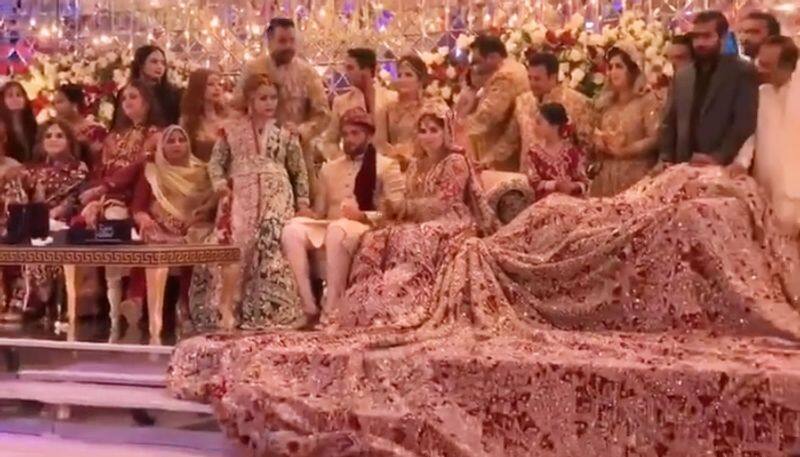 Pakistani bride's 100-kg lehenga amazes netizens; watch the video-tgy