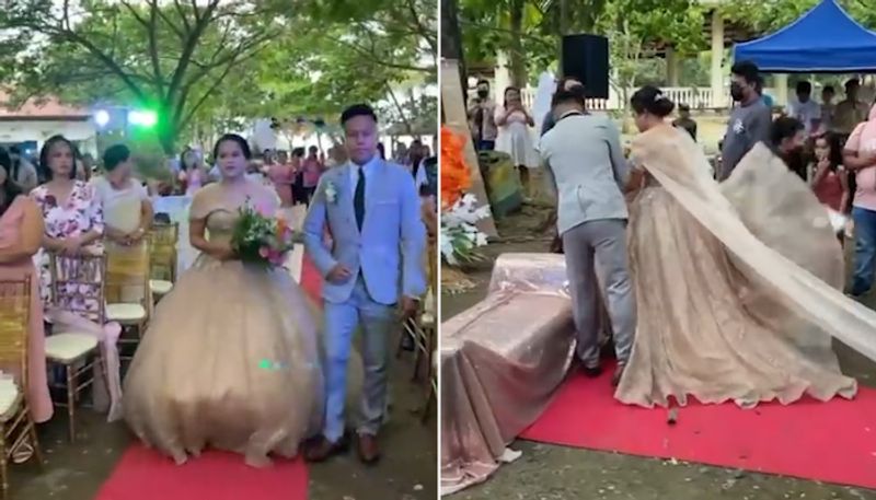 Man hiding under bride's wedding dress leaves internet in splits; Watch the video-tgy