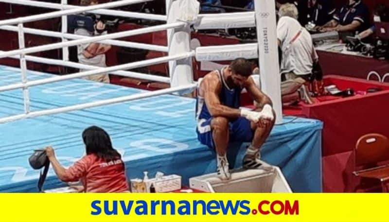 Tokyo Olympics 2021 France Boxer Mourad Aliev protests with Sit in Ring after Disqualification by referee kvn