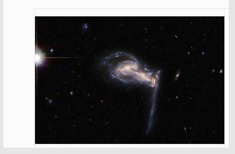 NASA Hubble images of galaxies in tug of war gcw