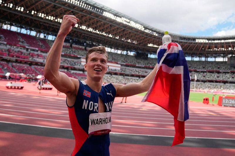 Karsten Warholm of Norway wins 400m hurdles in world record time