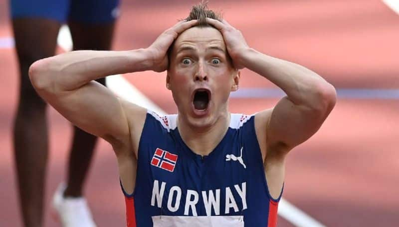 Karsten Warholm of Norway wins 400m hurdles in world record time