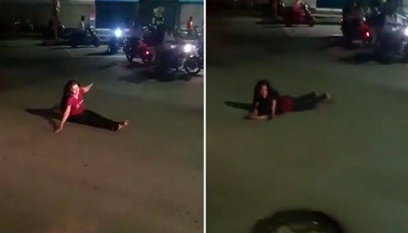 Pune Intoxicated woman blocks traffic; watch viral video-tgy