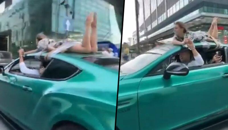 Russian 'influencer' drives with girlfriend tied to car roof for 'trust test'; watch video - gps