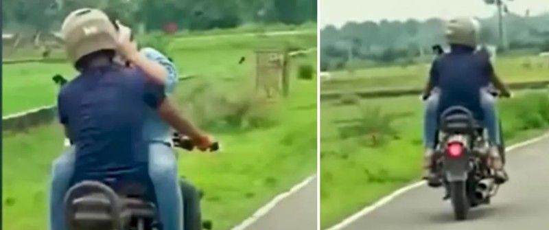 video of a woman sitting on the fuel tank of a bike facing a man has gone viral