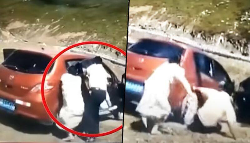 Terrifying moment: Family bounce out of the car, goes down the cliff - gps