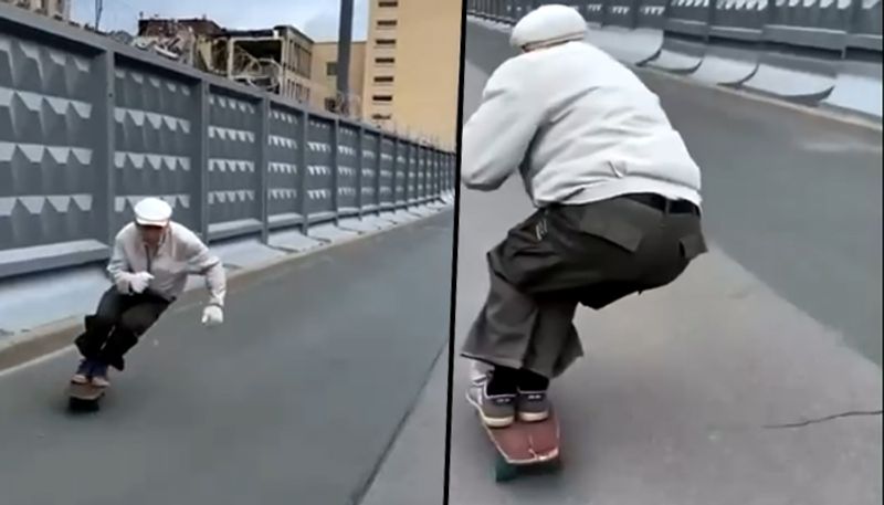 73 year old man speeds on his skateboard