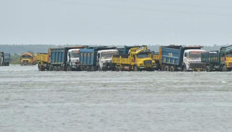 132 trucks pulled out from krishna water with crane in krishna district