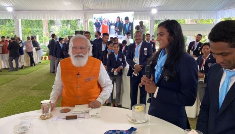 PM Modi Fulfills Promise of Ice Cream with Badminton star PV Sindhu