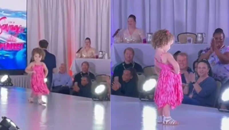 little girl walks the ramp and the video goes viral