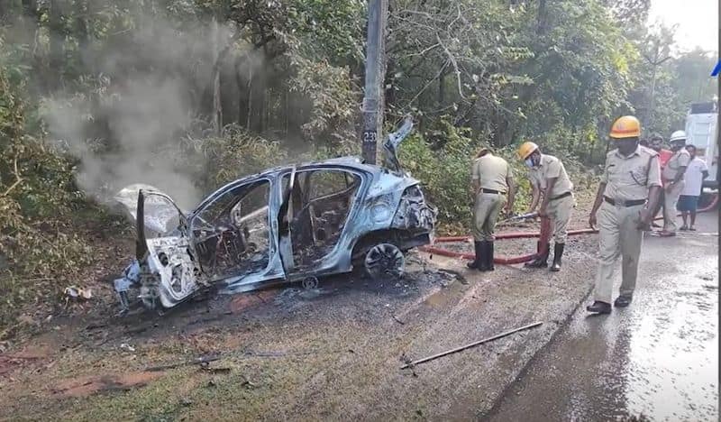 Car Topples and catches fire Miraculous Escape For Driver in Karwar ckm