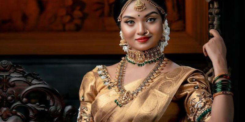 Soorya menon photoshoot in gold sari