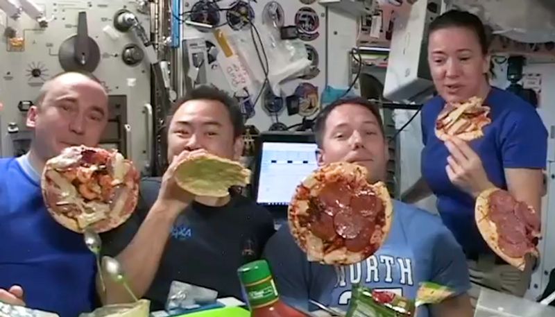 Astronauts enjoy 'floating pizza night' aboard International Space Station; watch the video-tgy