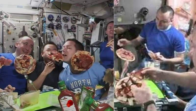 Astronauts enjoy floating pizza party  at ISS