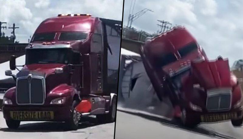 Train crashes into 18-wheeler carrying wind turbine blade; watch video - gps