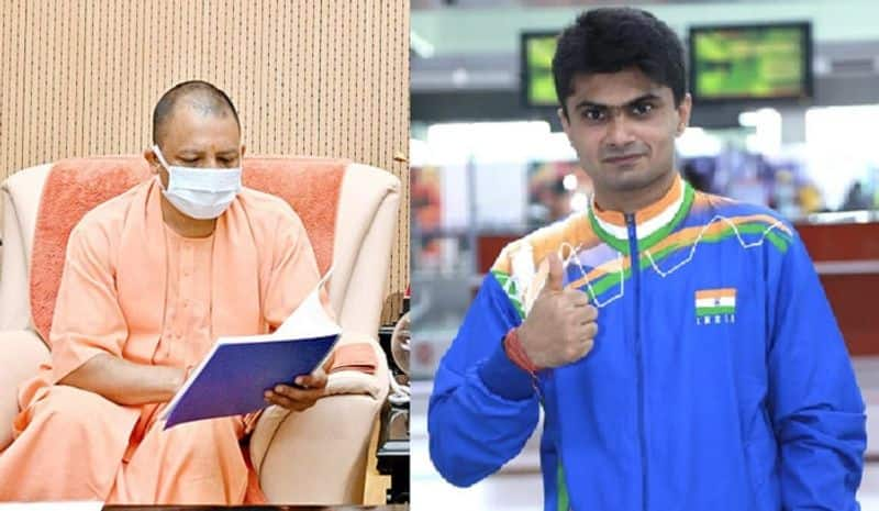 Uttar Pradesh CM Yogi Adityanath wishes paralympics sliver medalist IAS officer Suhas Yathiraj ckm