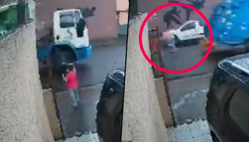 Heres how sanitation worker saved a boy from being run over by car; watch video - gps